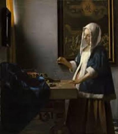Vermeer - Woman holding a Balance